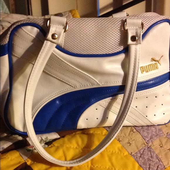 white and gold puma handbag